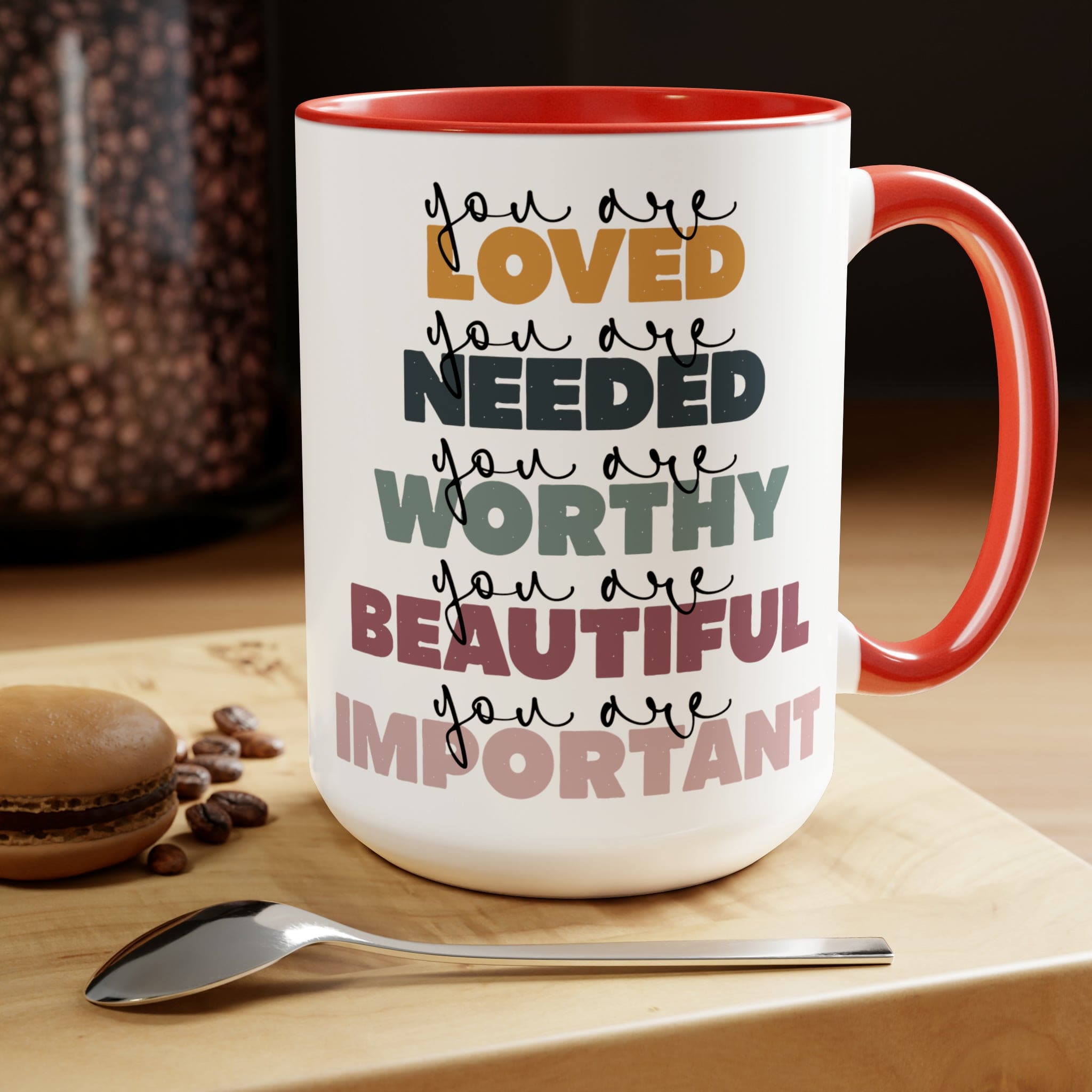 You Are Loved Ceramic Coffee Mug with a white exterior and colored interior, featuring a C-handle and inspirational message.