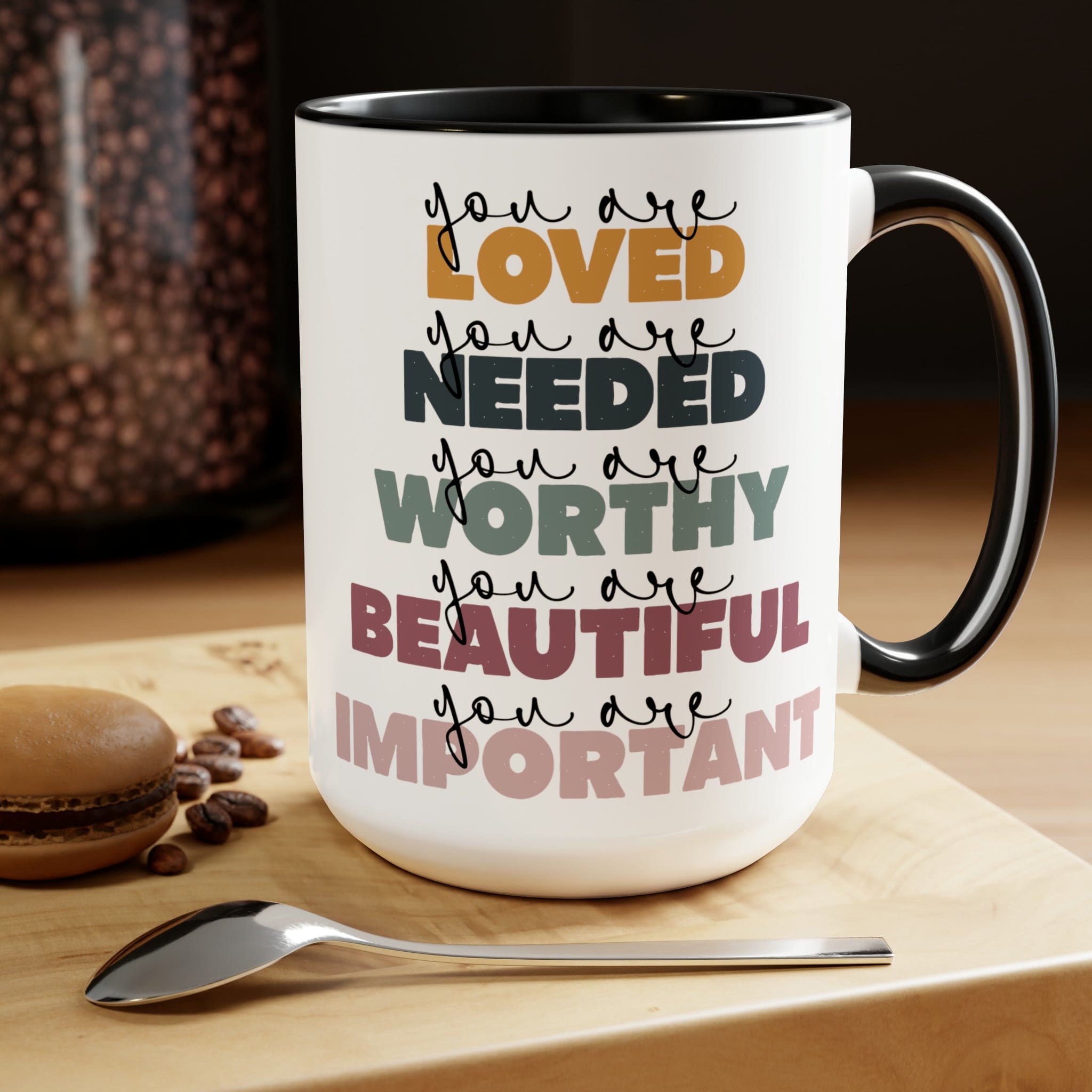 You Are Loved Ceramic Coffee Mug with a white exterior and colored interior, featuring a C-handle and inspirational message.