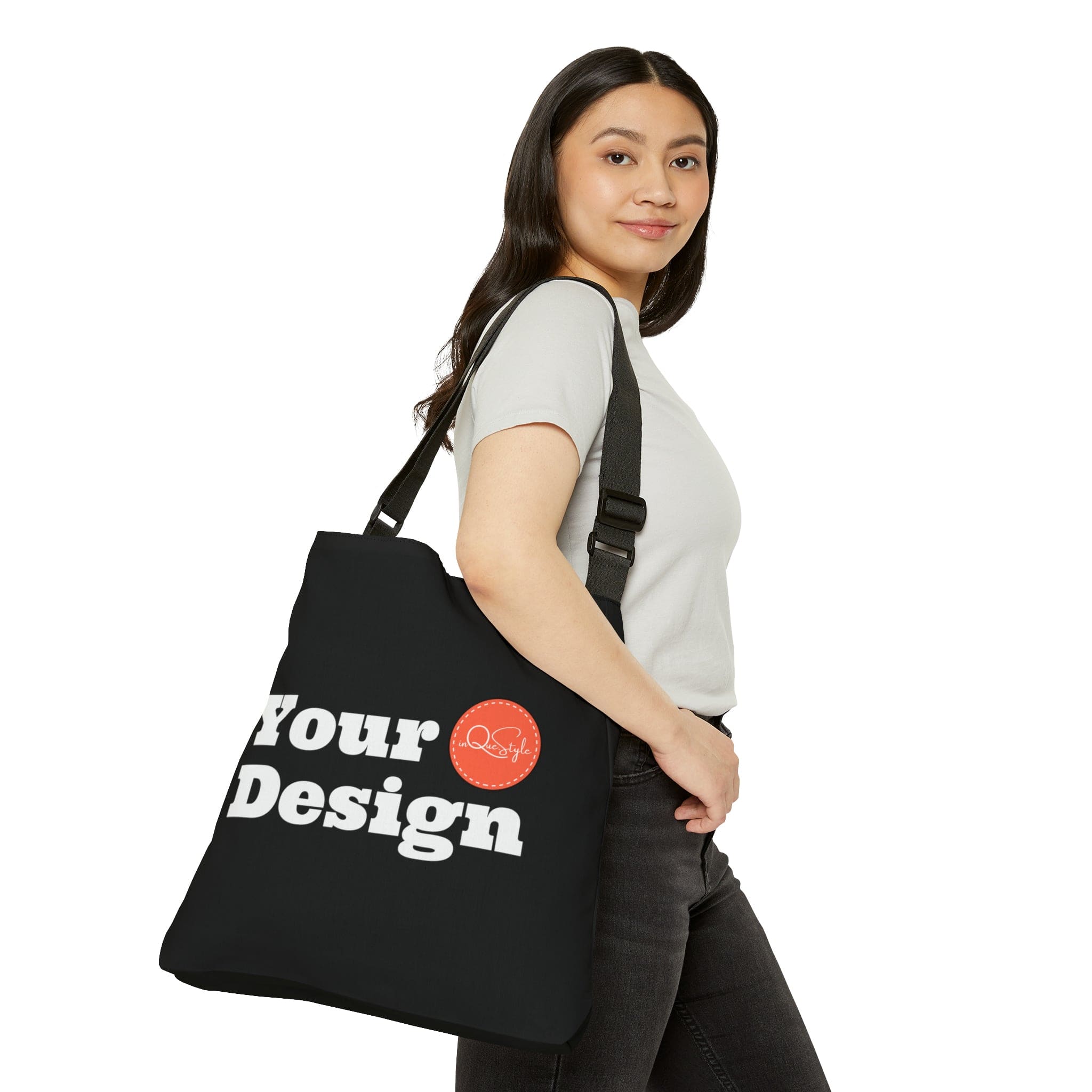 Adjustable Black Tote Bag made of spun polyester with adjustable straps and zippered pocket.