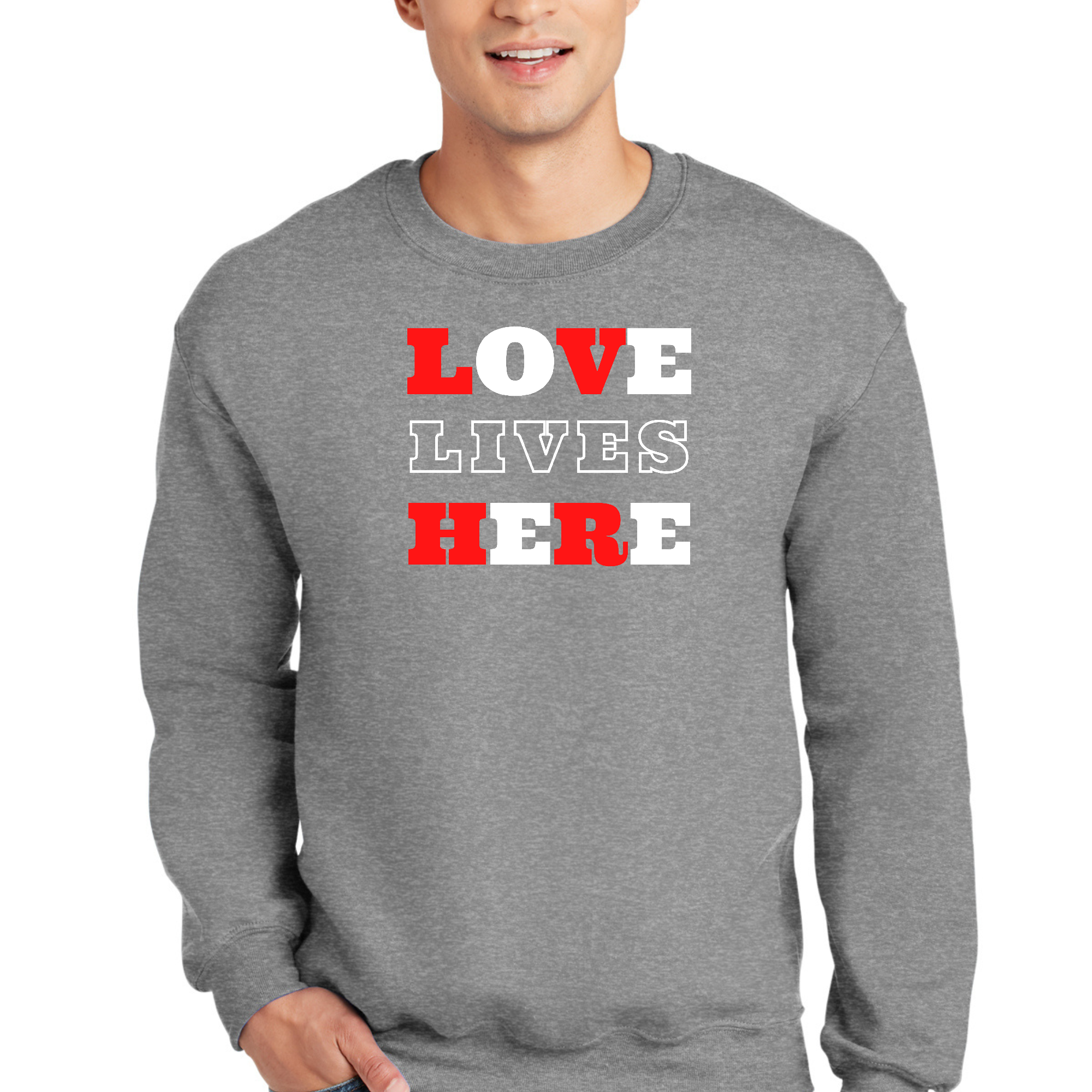 Adult unisex long sleeve sweatshirt featuring 'Love Lives Here' Christian graphic design, showcasing a soft and durable fabric.