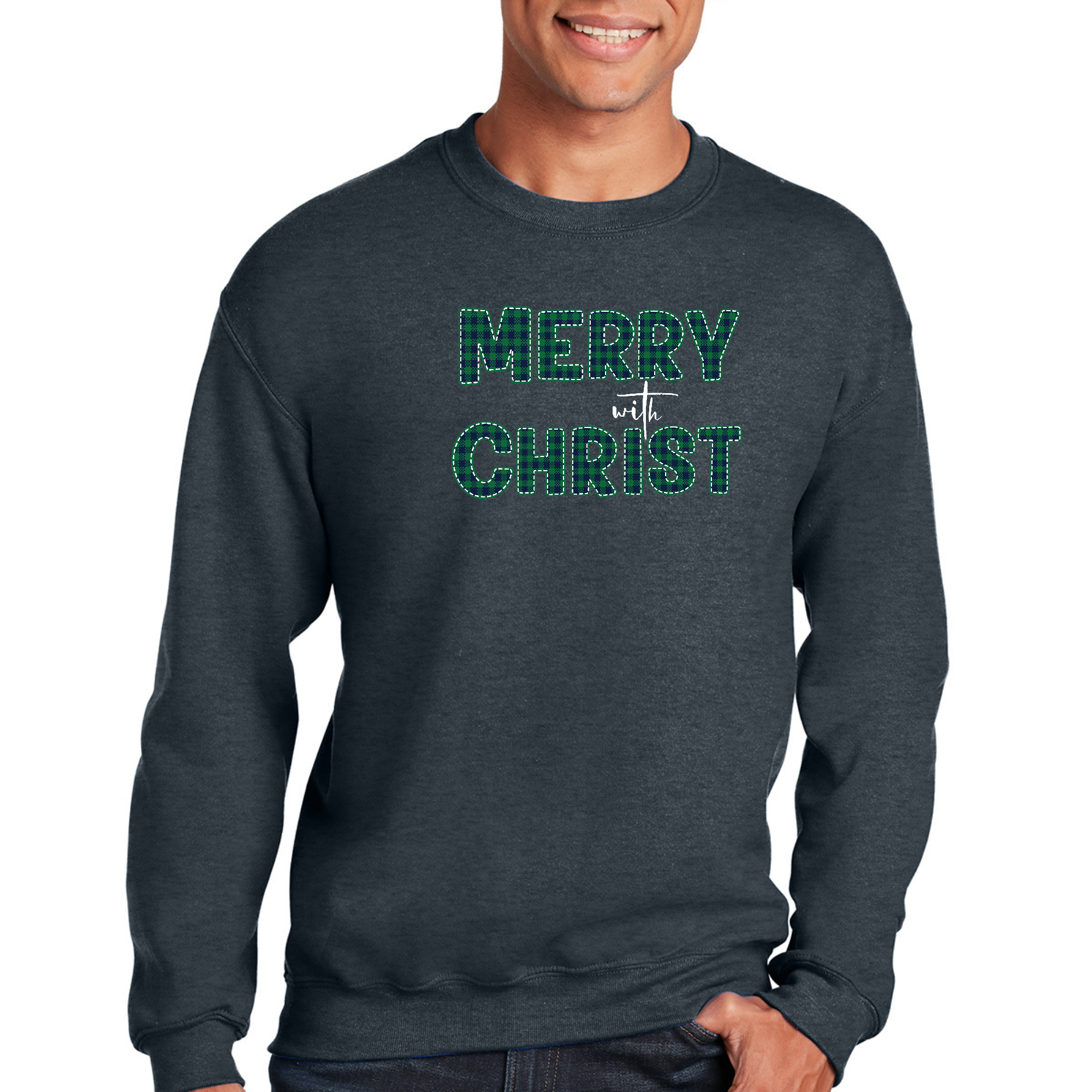 Adult unisex long sleeve sweatshirt in green plaid with Merry With Christ graphic design, showcasing its soft fabric and comfortable fit.