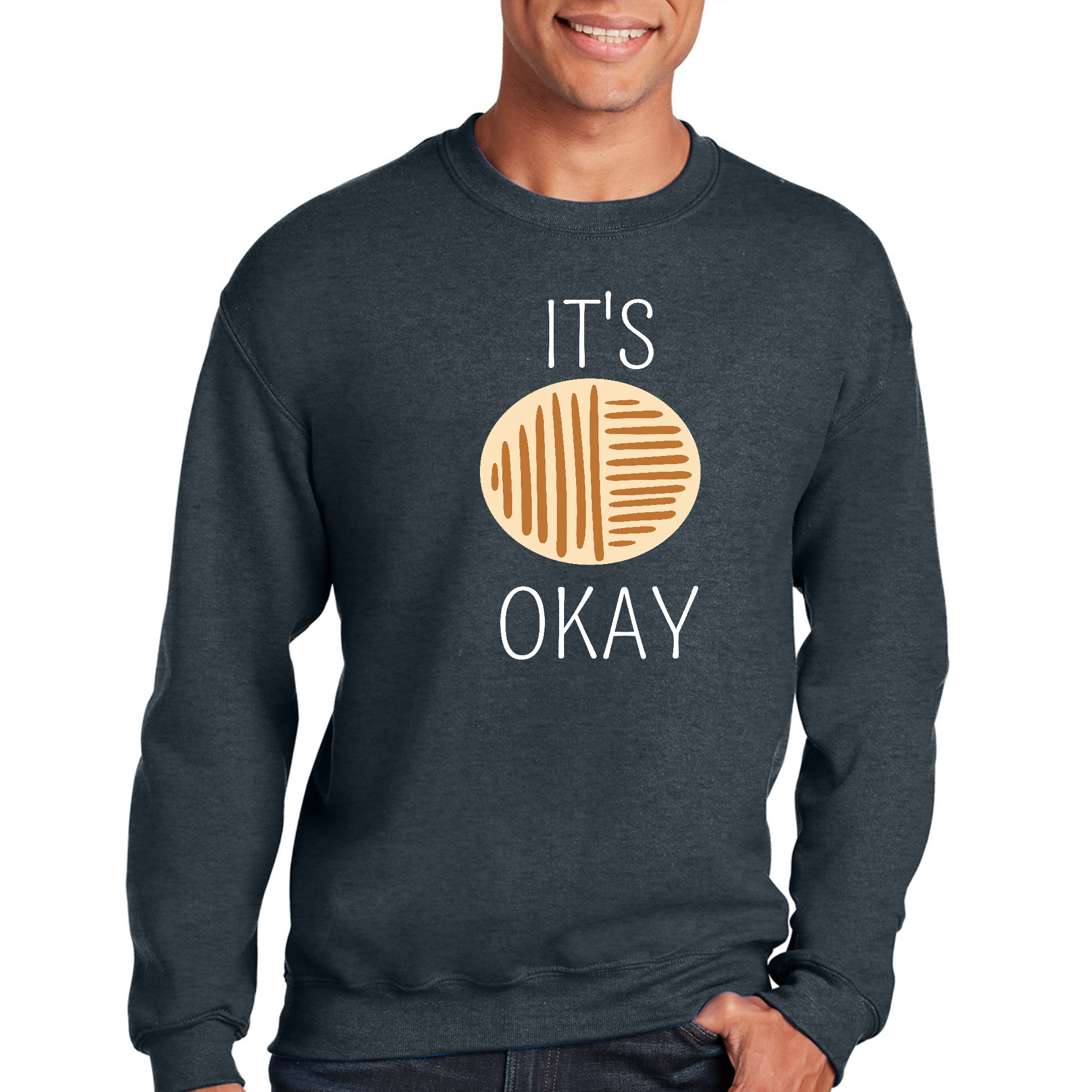 Adult unisex long sleeve sweatshirt in white featuring the graphic 'It's Okay' for a stylish and comfortable look.