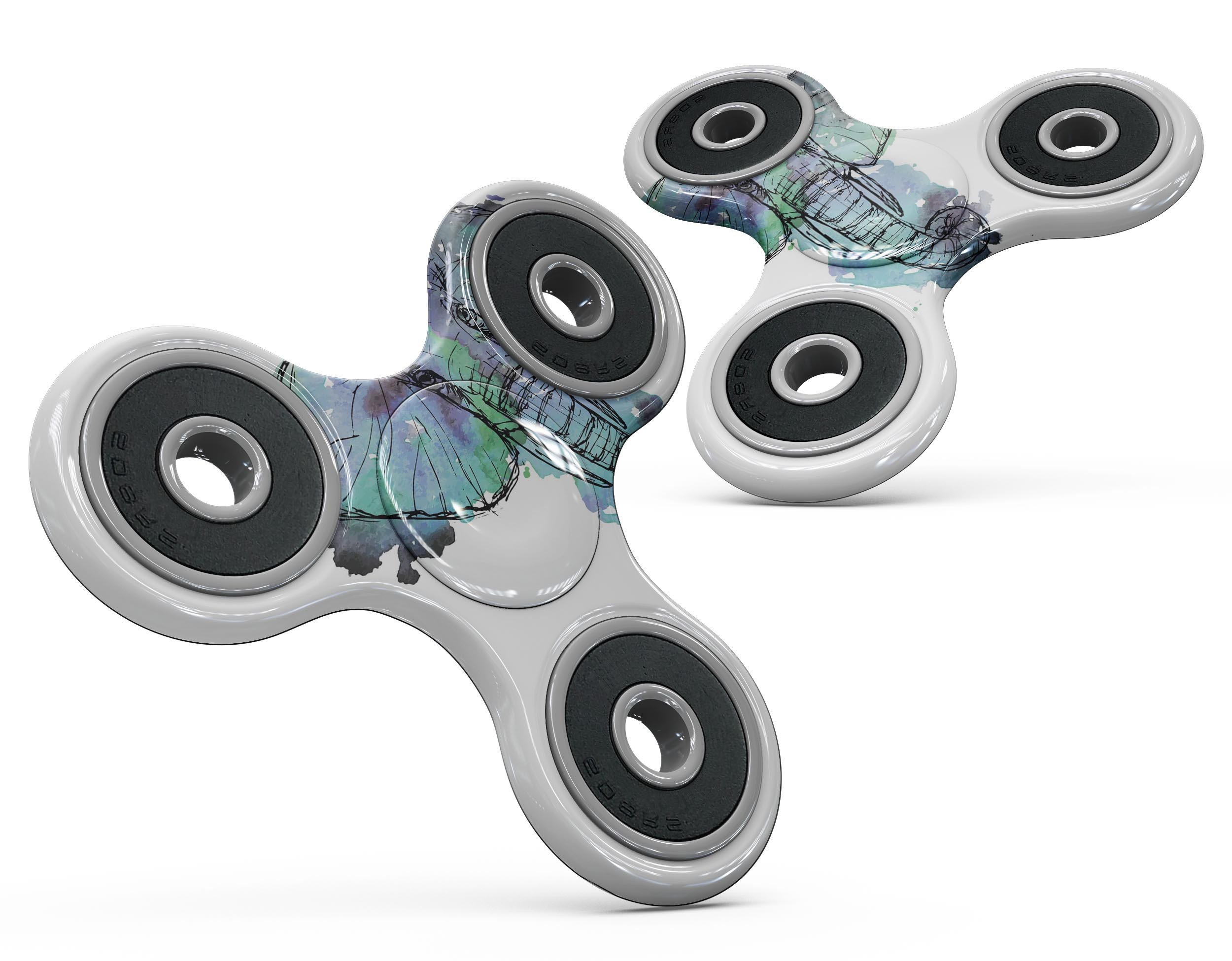 African Sketch Elephant design on a fidget spinner skin kit, showcasing vibrant colors and intricate patterns.