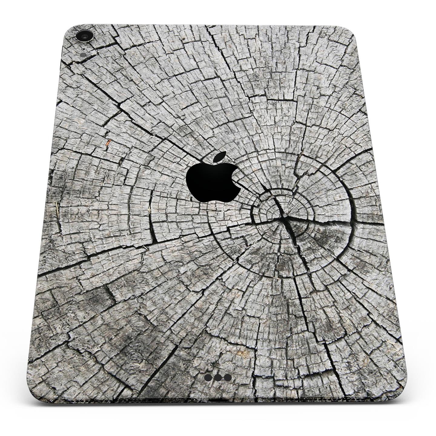 Aged Cracked Tree Stump Core skin decal for Apple iPad, showcasing a rustic design with premium 3M material for protection.