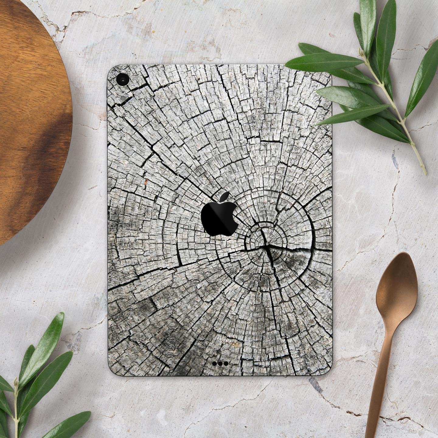 Aged Cracked Tree Stump Core skin decal for Apple iPad, showcasing a rustic design with premium 3M material for protection.