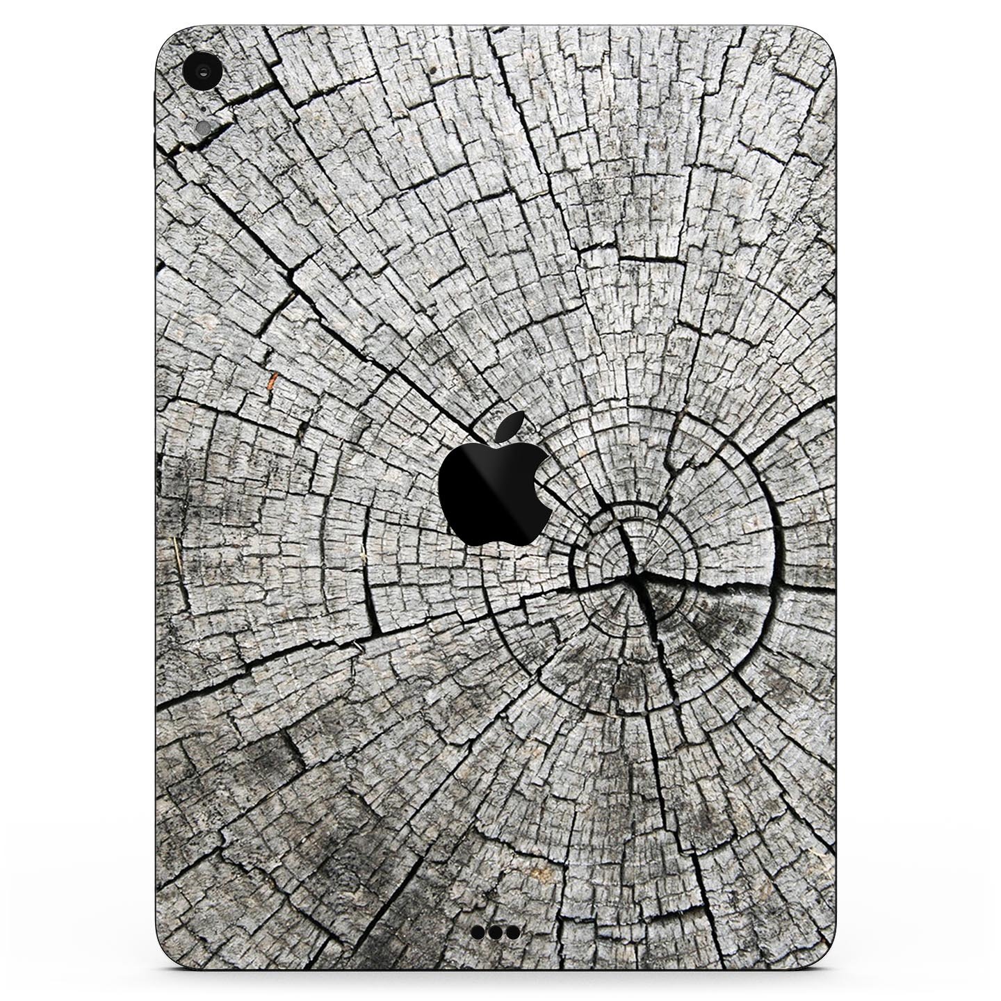 Aged Cracked Tree Stump Core skin decal for Apple iPad, showcasing a rustic design with premium 3M material for protection.