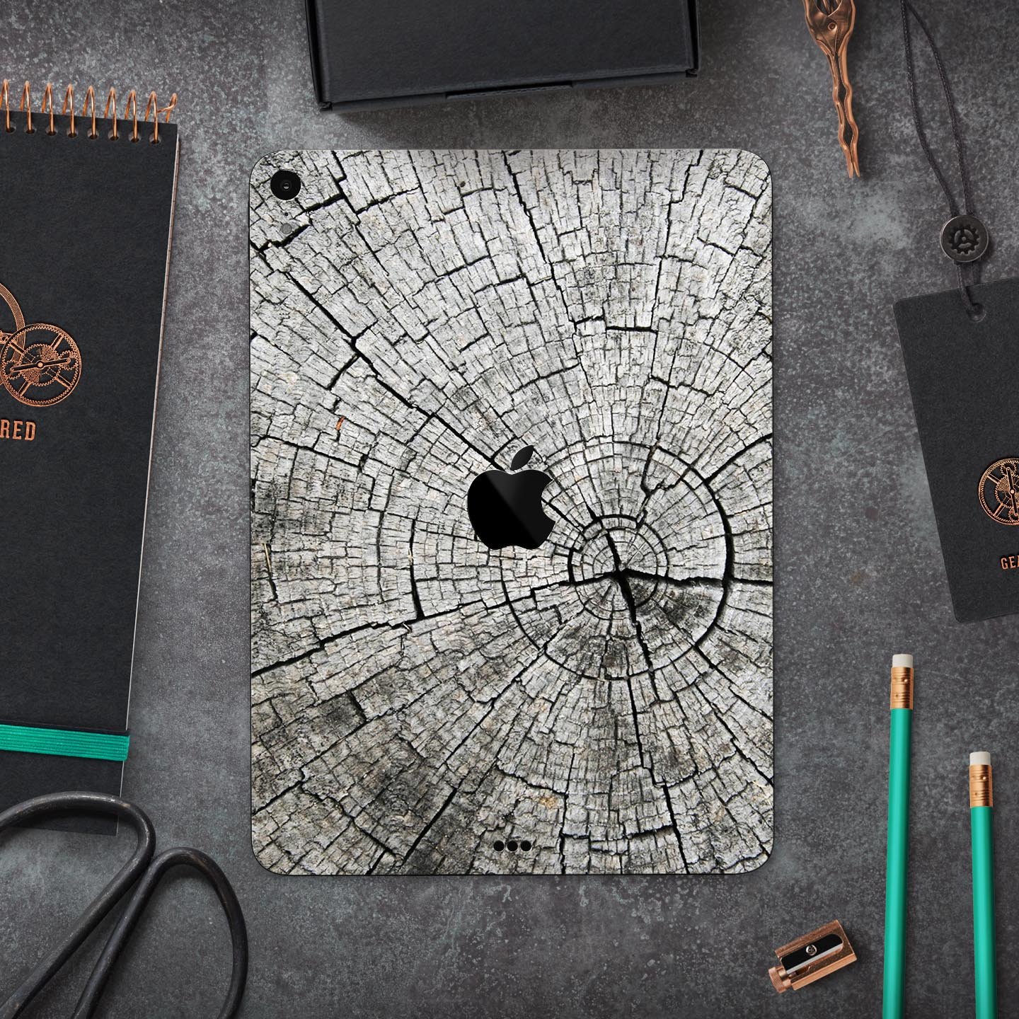 Aged Cracked Tree Stump Core skin decal for Apple iPad, showcasing a rustic design with premium 3M material for protection.