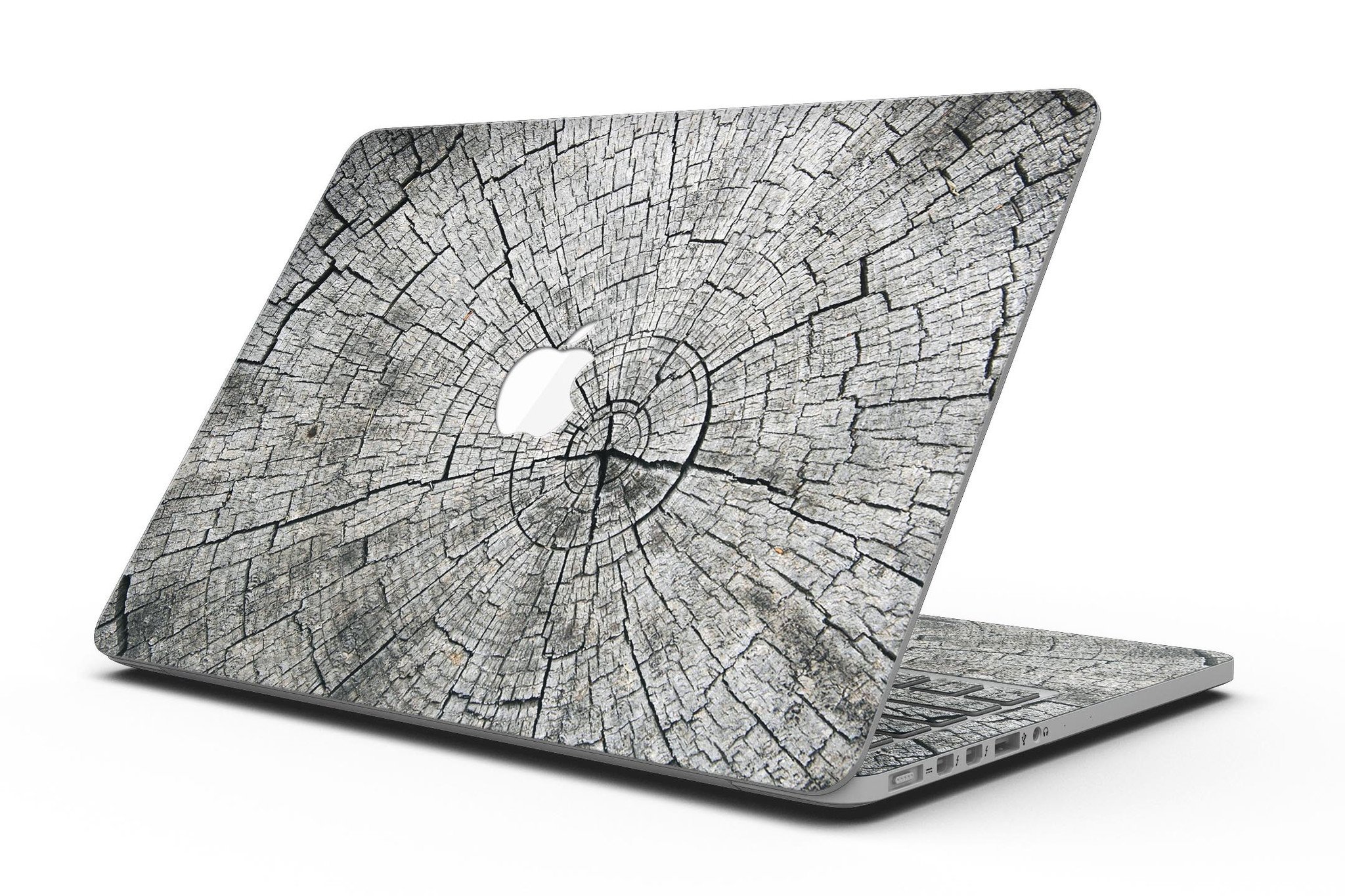 Aged Cracked Tree Stump Core skin for MacBook Pro with Retina Display, showcasing a unique design that adds style and protection.