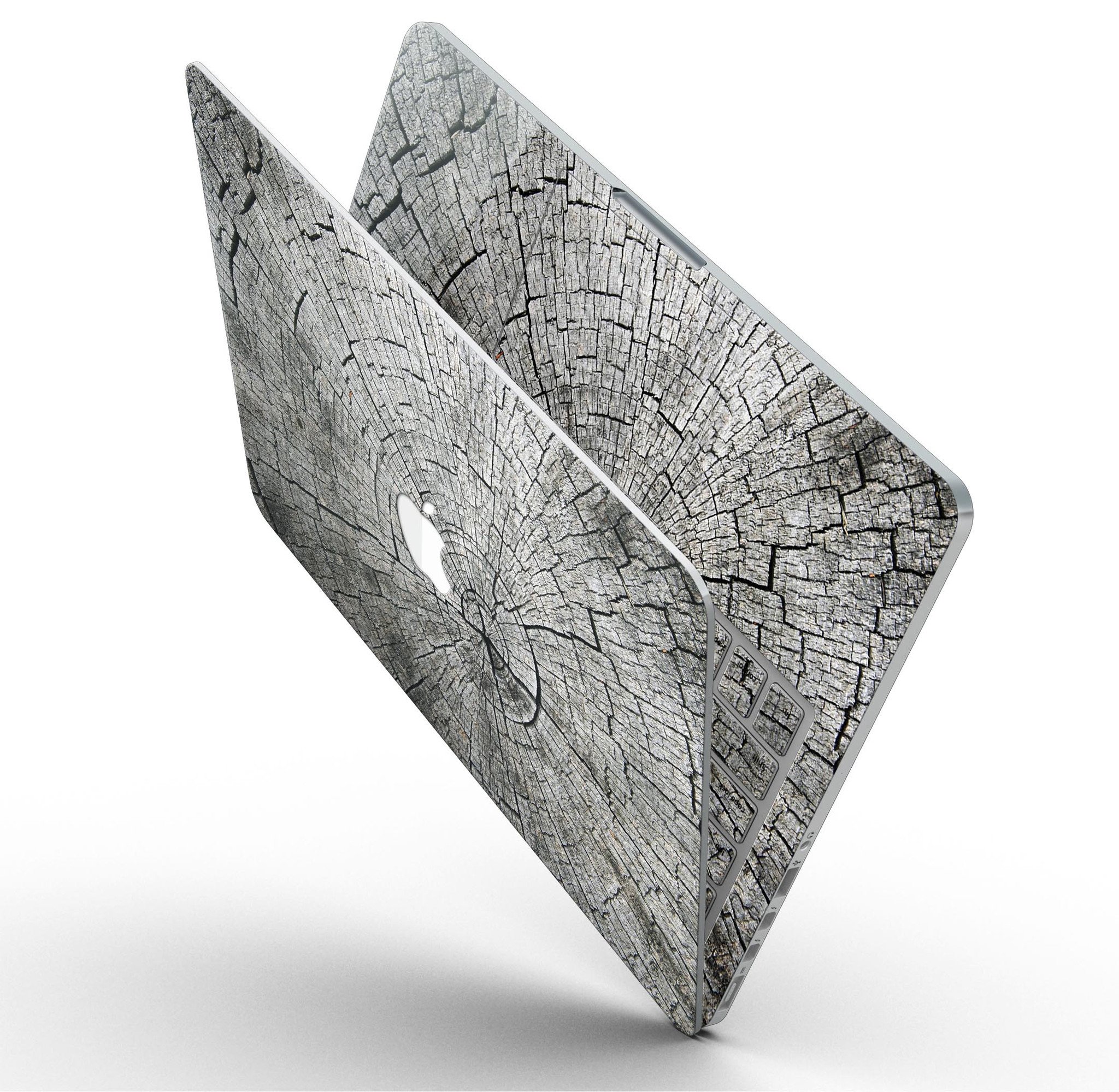 Aged Cracked Tree Stump Core skin for MacBook Pro with Retina Display, showcasing a unique design that adds style and protection.