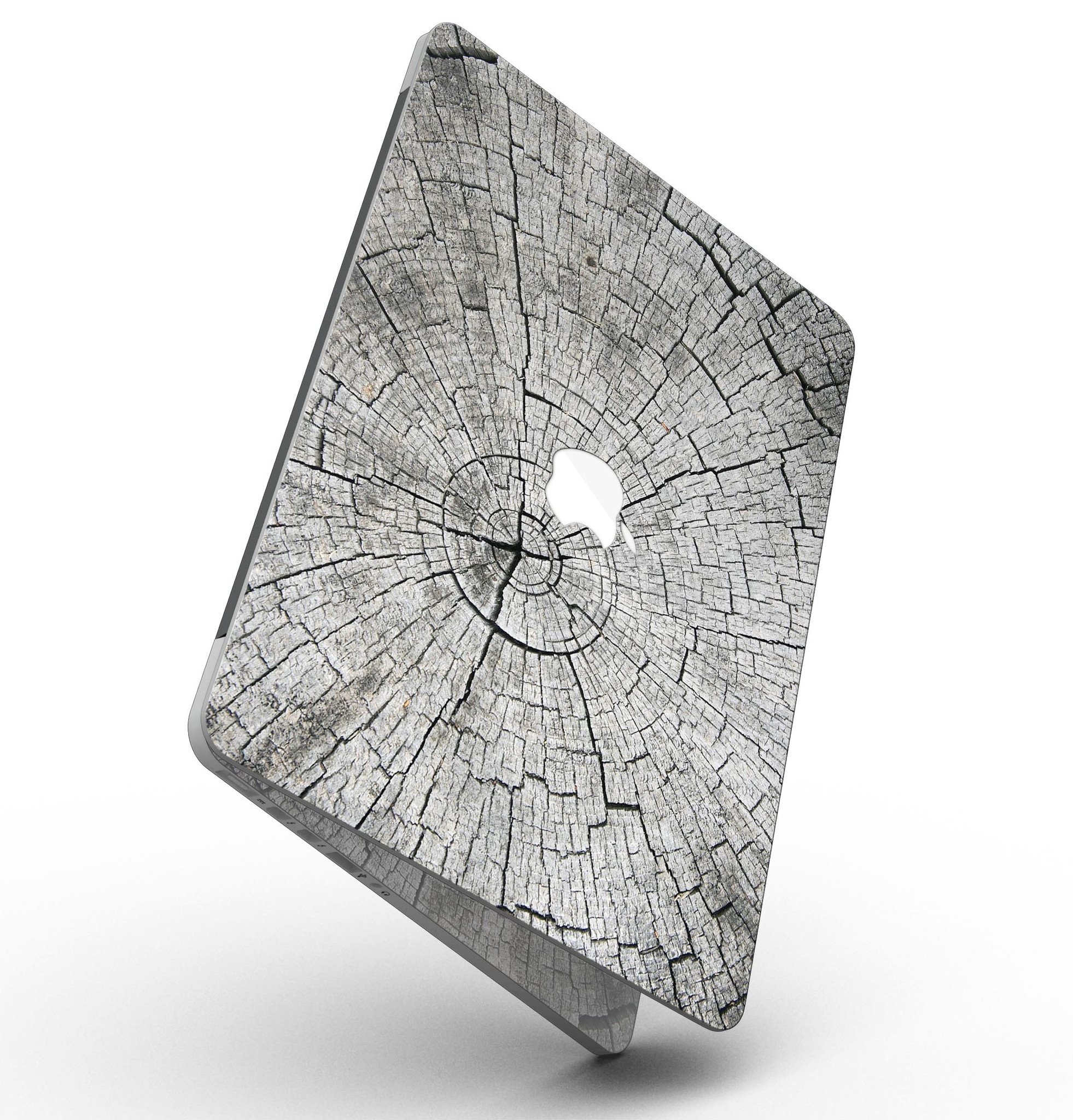 Aged Cracked Tree Stump Core skin for MacBook Pro with Retina Display, showcasing a unique design that adds style and protection.