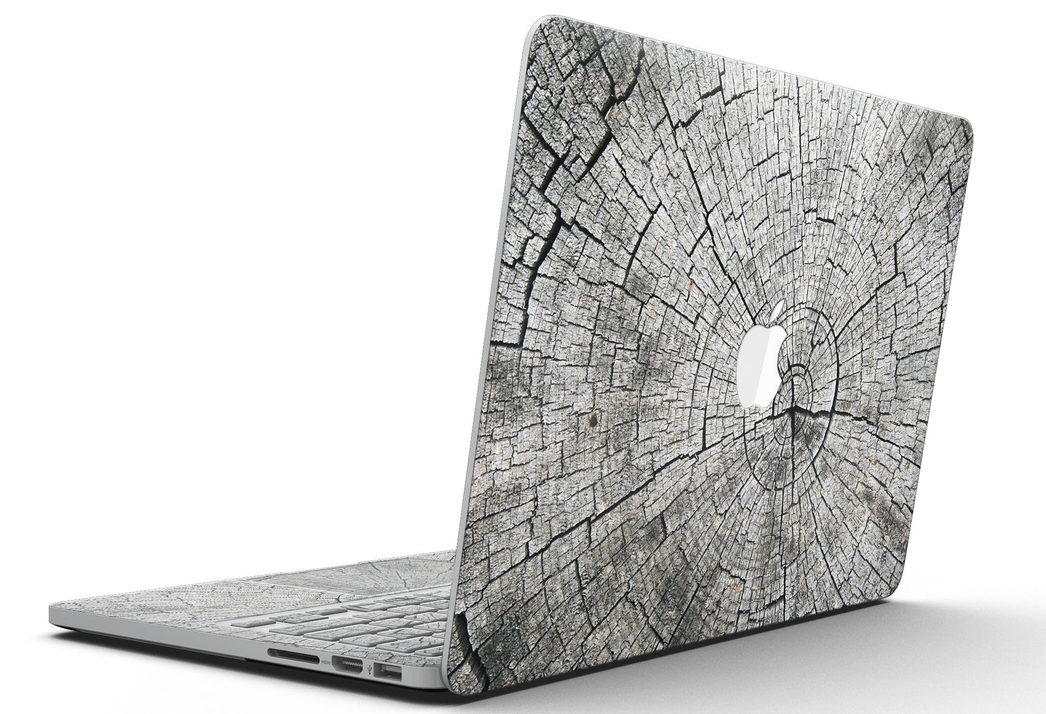 Aged Cracked Tree Stump Core skin for MacBook Pro with Retina Display, showcasing a unique design that adds style and protection.