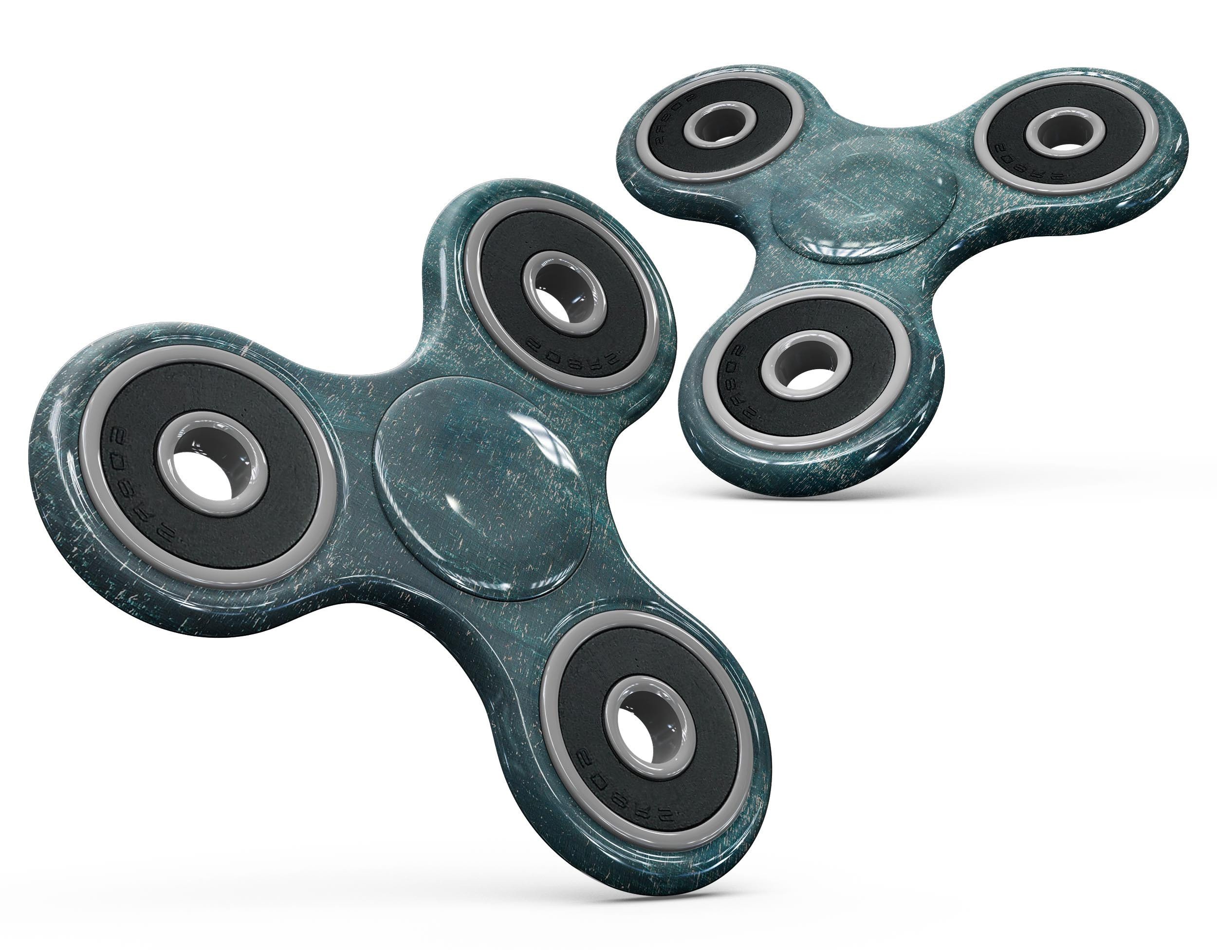 Aged green paint surface fidget spinner skin kit showcasing its premium vinyl material and unique design.