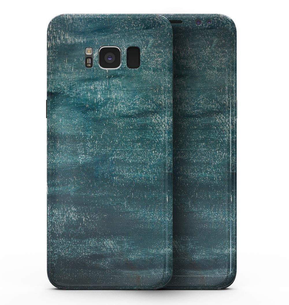 Aged Green Paint Surface skin applied to a Samsung Galaxy S8, showcasing its sleek design and vibrant color.