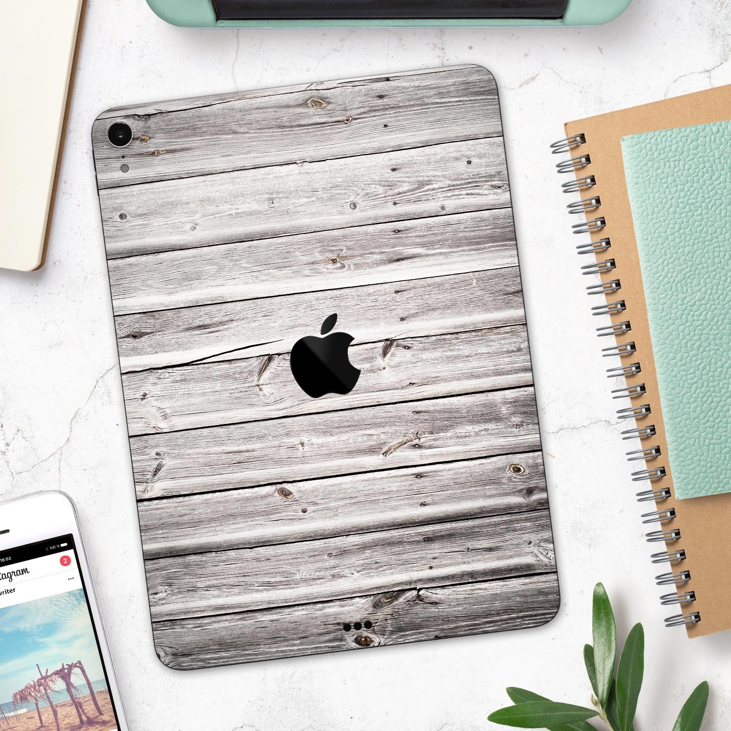 Aged White Wood Planks skin decal for Apple iPad Pro, showcasing a rustic wood design that enhances device aesthetics.