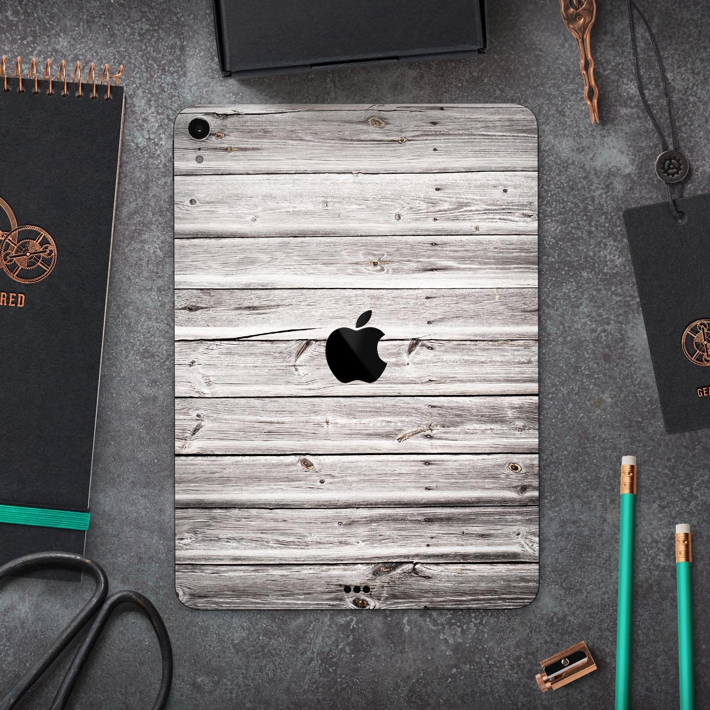 Aged White Wood Planks skin decal for Apple iPad Pro, showcasing a rustic wood design that enhances device aesthetics.