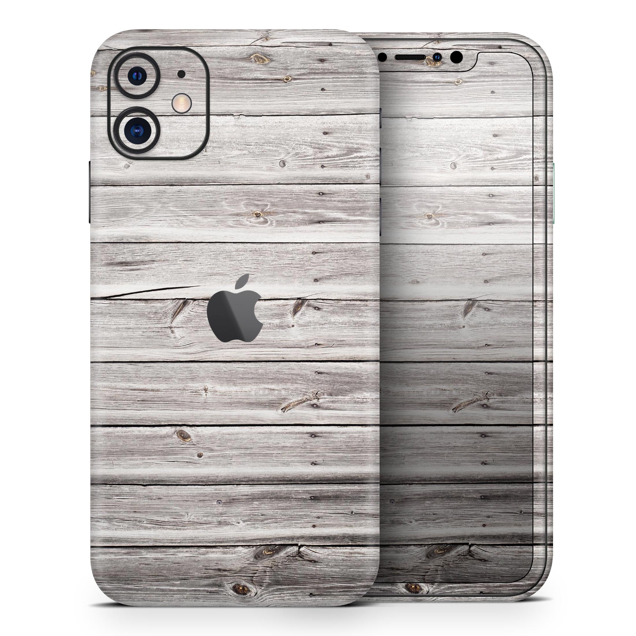 Aged White Wood Planks Skin-Kit for Apple iPhone 13, showcasing a stylish wood design that enhances the phone's appearance.