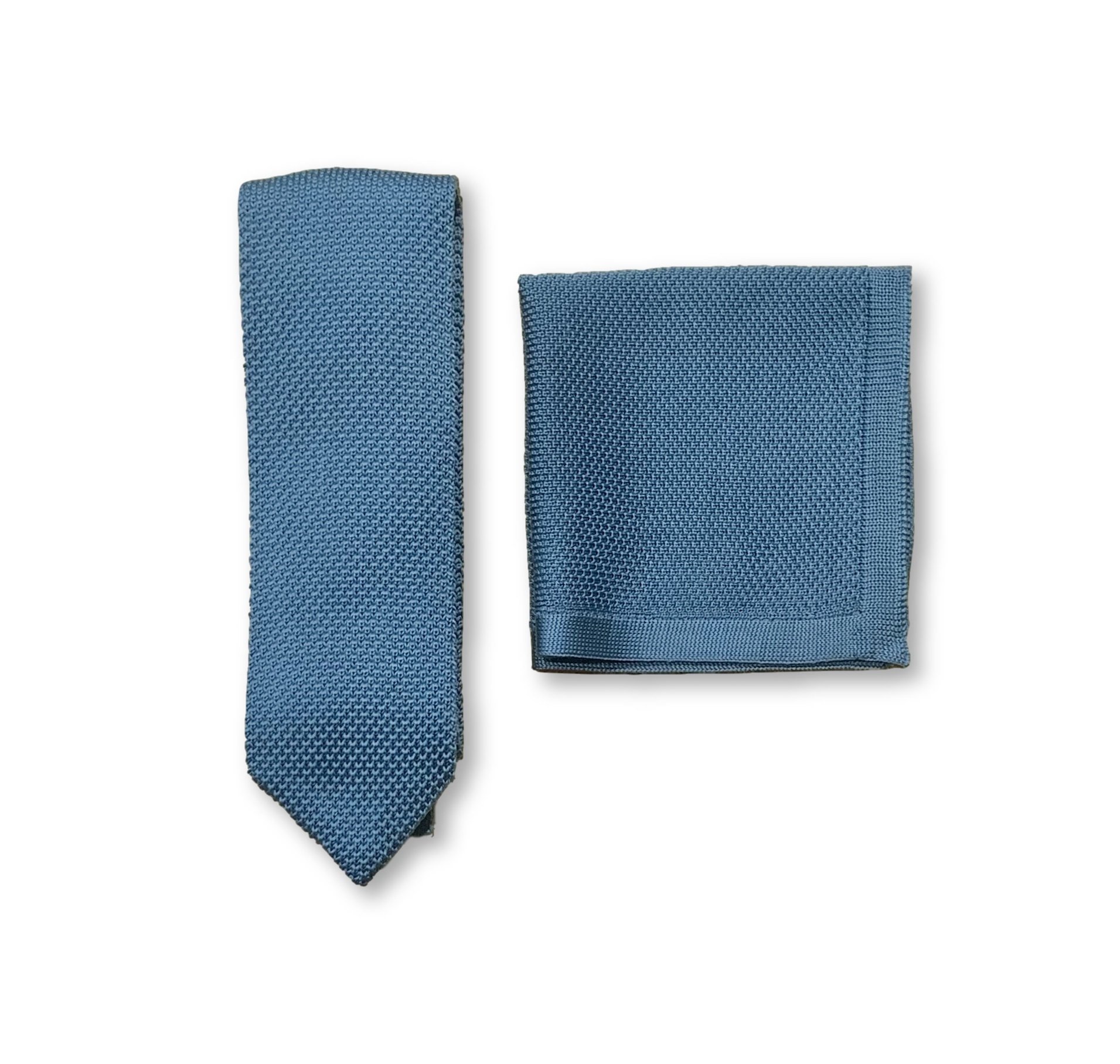 Air Force Blue knitted tie and pocket square set displayed elegantly, showcasing the rich color and texture.