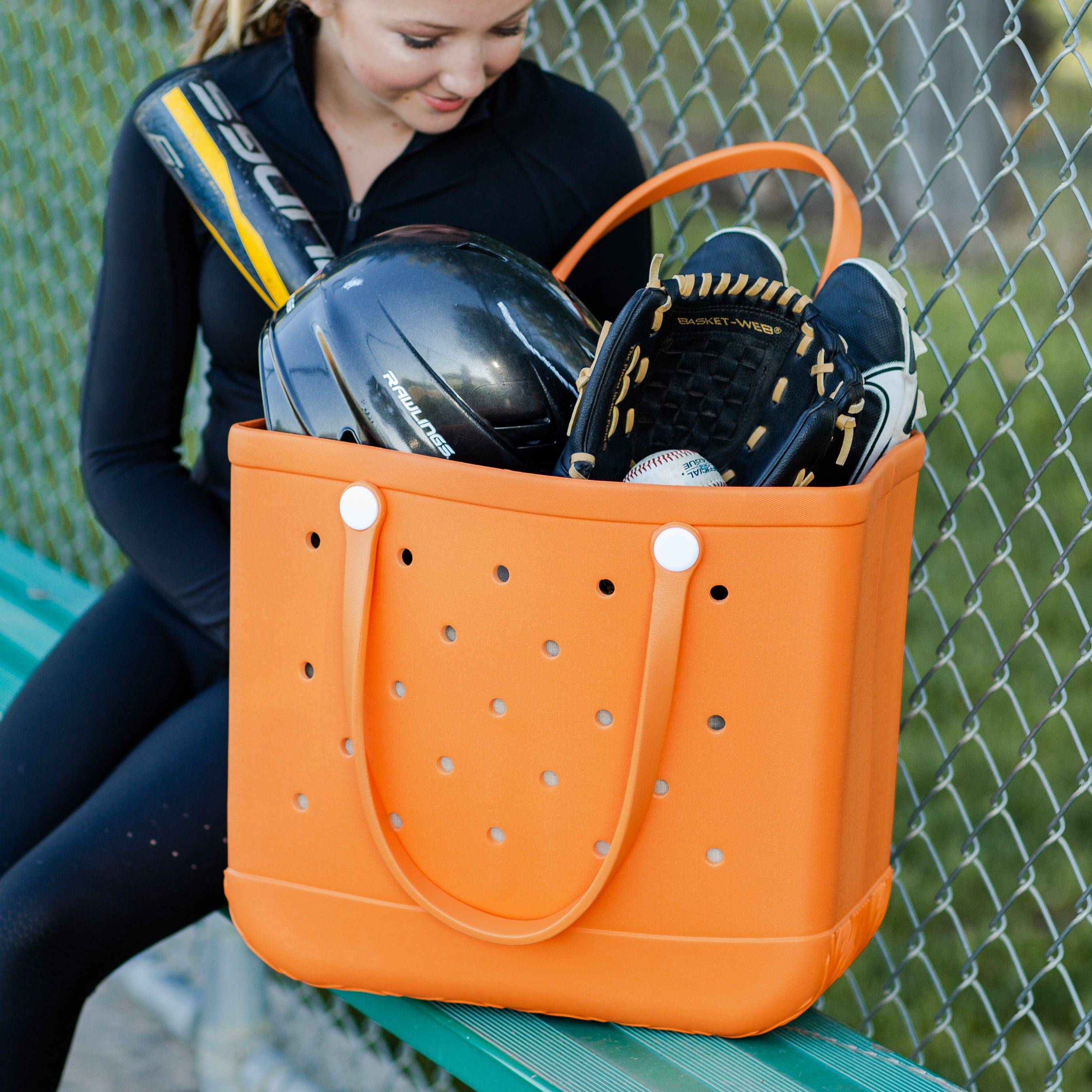 A vibrant All-Around Adventure X-Large Eva Tote in various colors, showcasing its spacious design and double handles, perfect for any occasion.