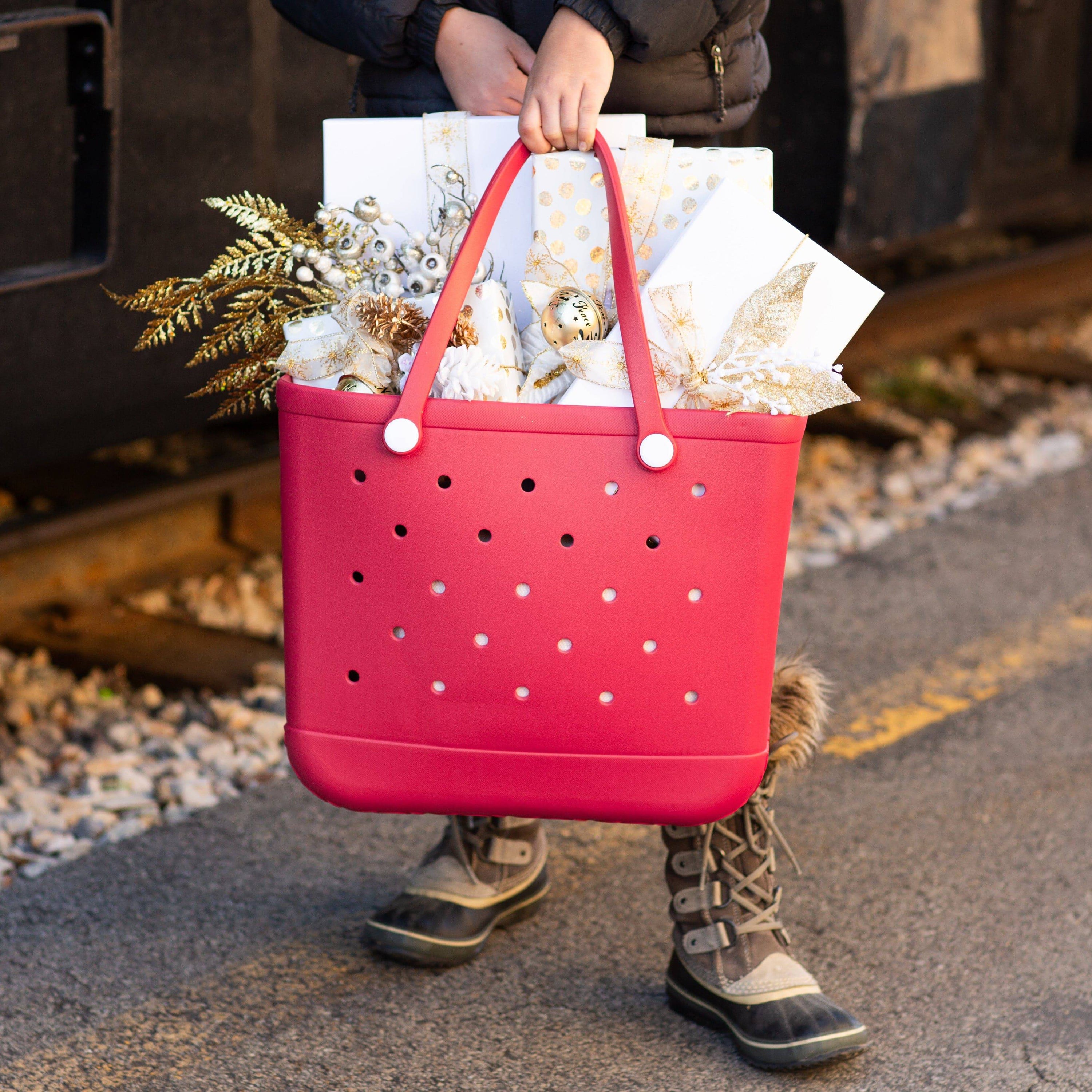 A vibrant All-Around Adventure X-Large Eva Tote in various colors, showcasing its spacious design and double handles, perfect for any occasion.