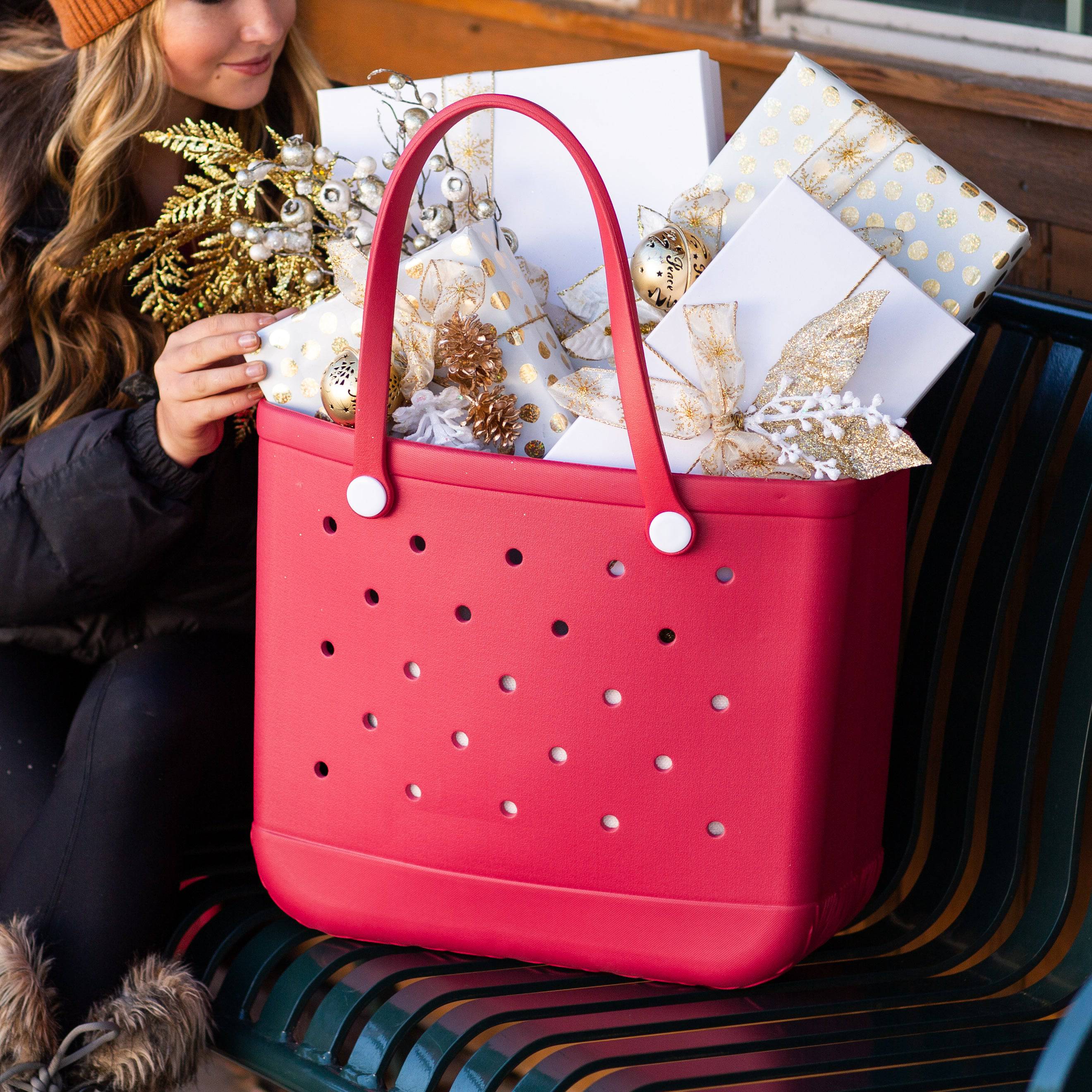 A vibrant All-Around Adventure X-Large Eva Tote in various colors, showcasing its spacious design and double handles, perfect for any occasion.