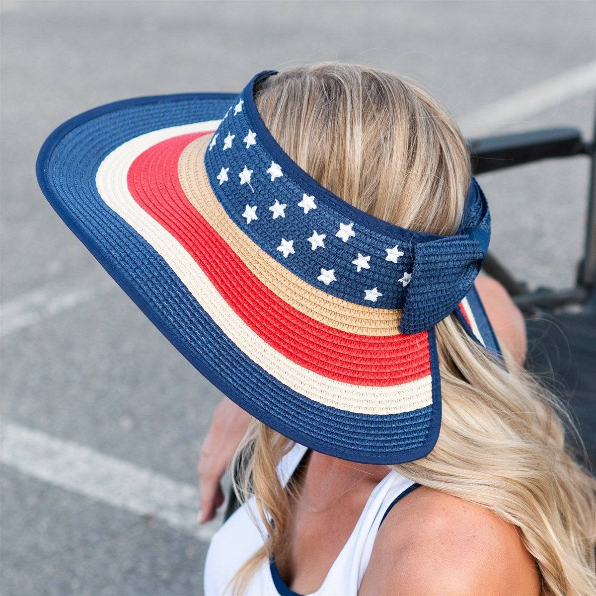 Americana Patriotic Rollable Visor featuring a decorative bow and adjustable strap, perfect for outdoor activities and 4th of July celebrations.