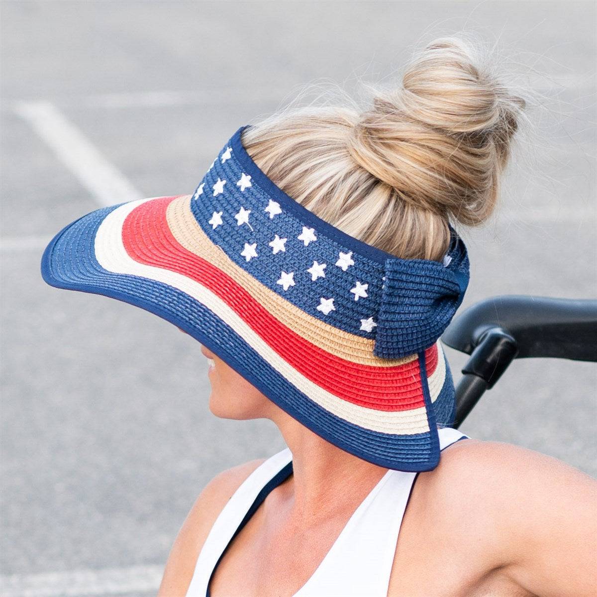 Americana Patriotic Rollable Visor featuring a decorative bow and adjustable strap, perfect for outdoor activities and 4th of July celebrations.