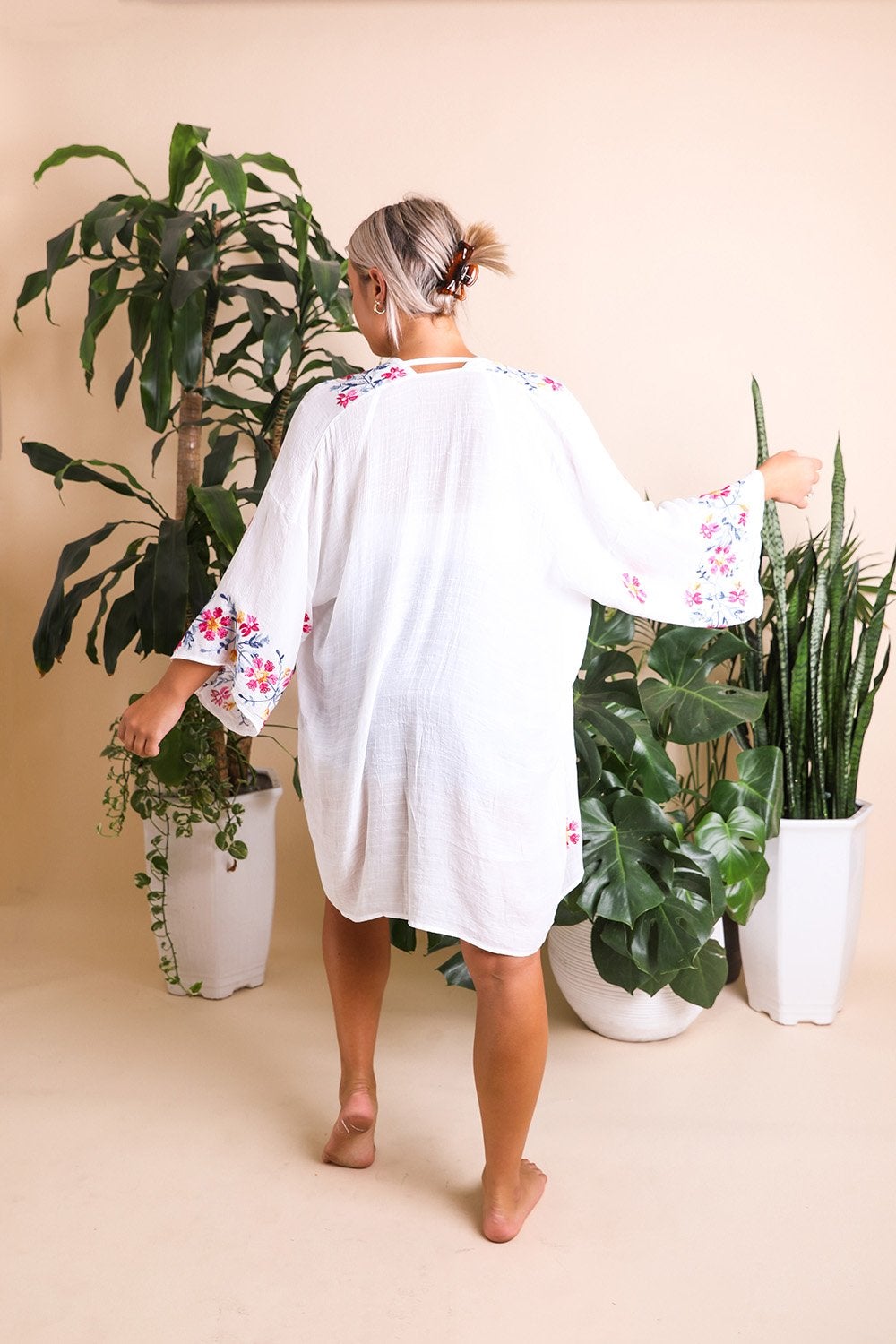 Anemone Embroidered Kimono featuring intricate Japanese embroidery and a coastal-inspired ikat print.