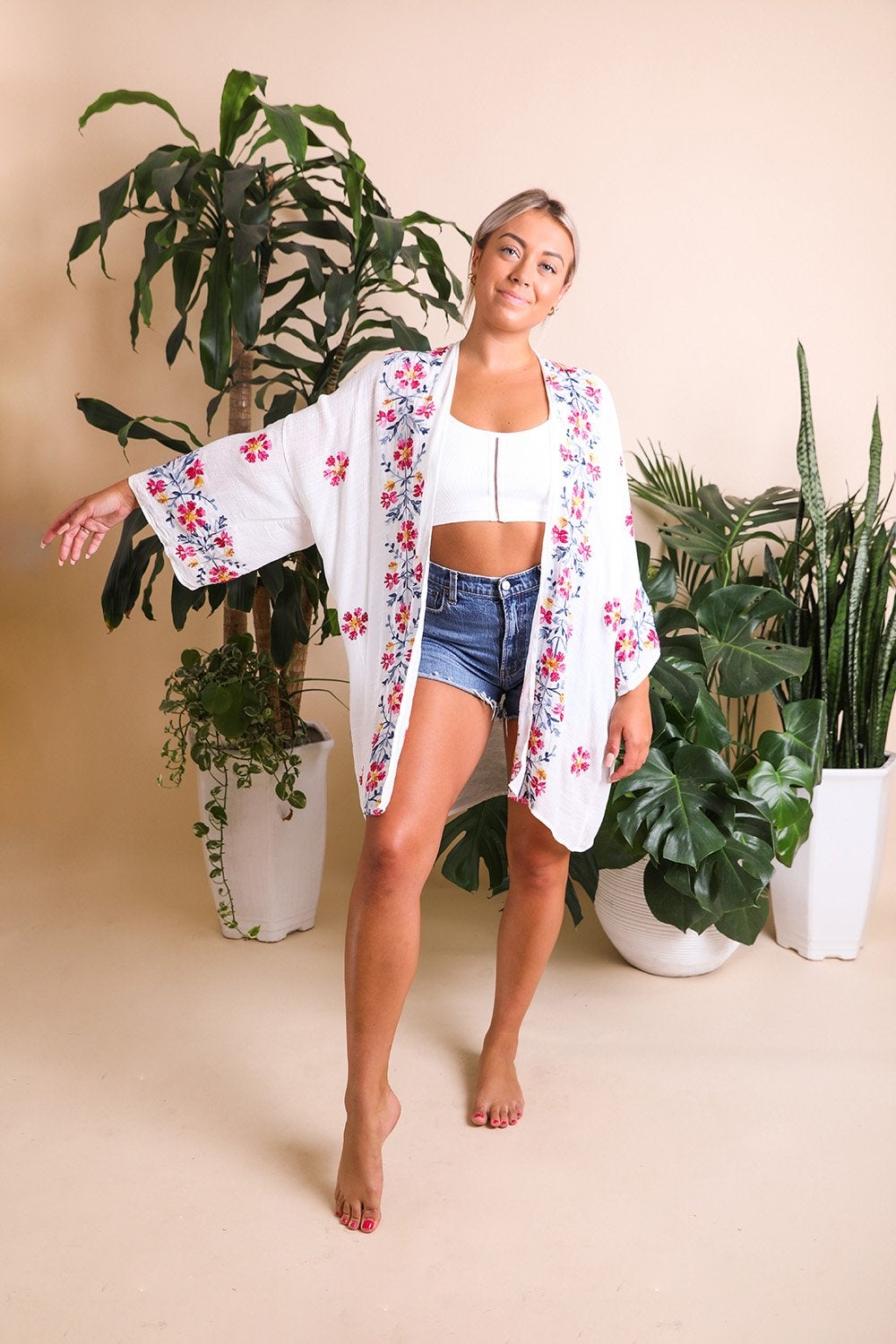 Anemone Embroidered Kimono featuring intricate Japanese embroidery and a coastal-inspired ikat print.