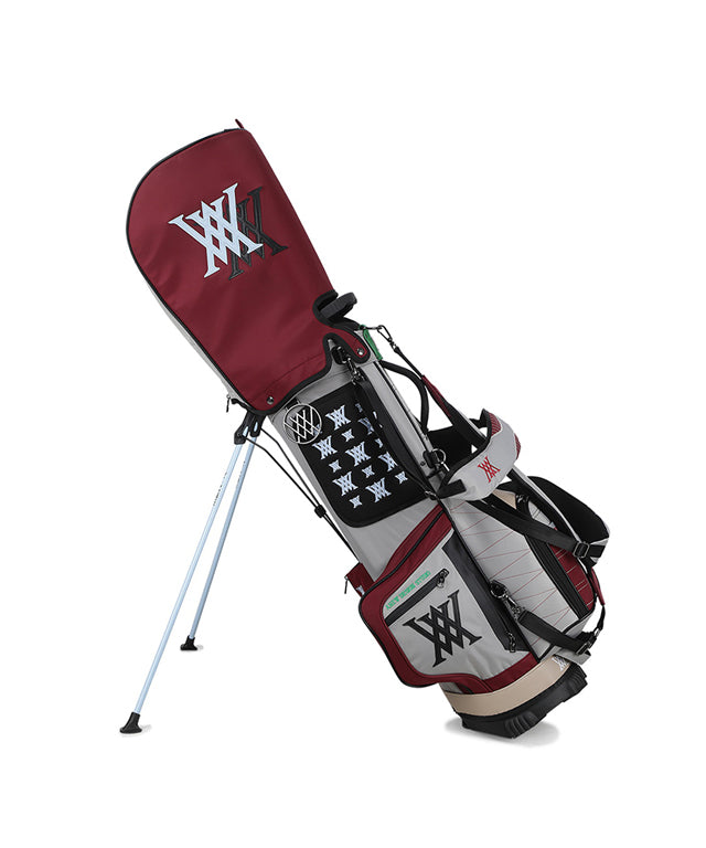 ANEW Golf Double Logo Stand Bag in Magenta featuring a unique curved camo pattern and luxurious embo-type material.