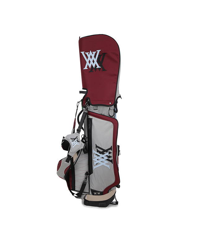 ANEW Golf Double Logo Stand Bag in Magenta featuring a unique curved camo pattern and luxurious embo-type material.