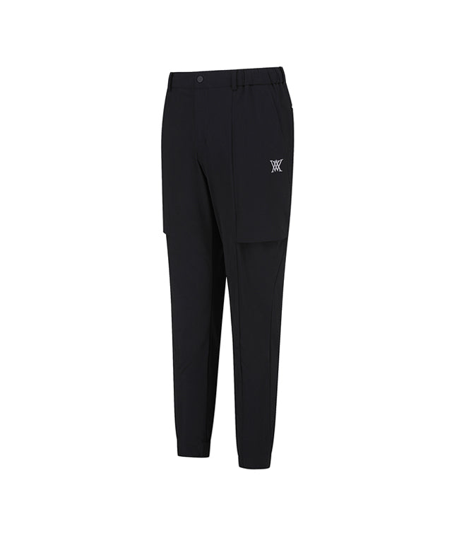 ANEW Golf Men Tricot Ventilation Long Pants in black, showcasing a modern jogger design with mesh ventilation and multiple pockets.