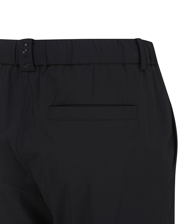 ANEW Golf Men Tricot Ventilation Long Pants in black, showcasing a modern jogger design with mesh ventilation and multiple pockets.