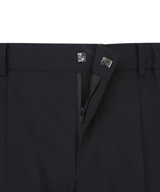 ANEW Golf Men Tricot Ventilation Long Pants in black, showcasing a modern jogger design with mesh ventilation and multiple pockets.