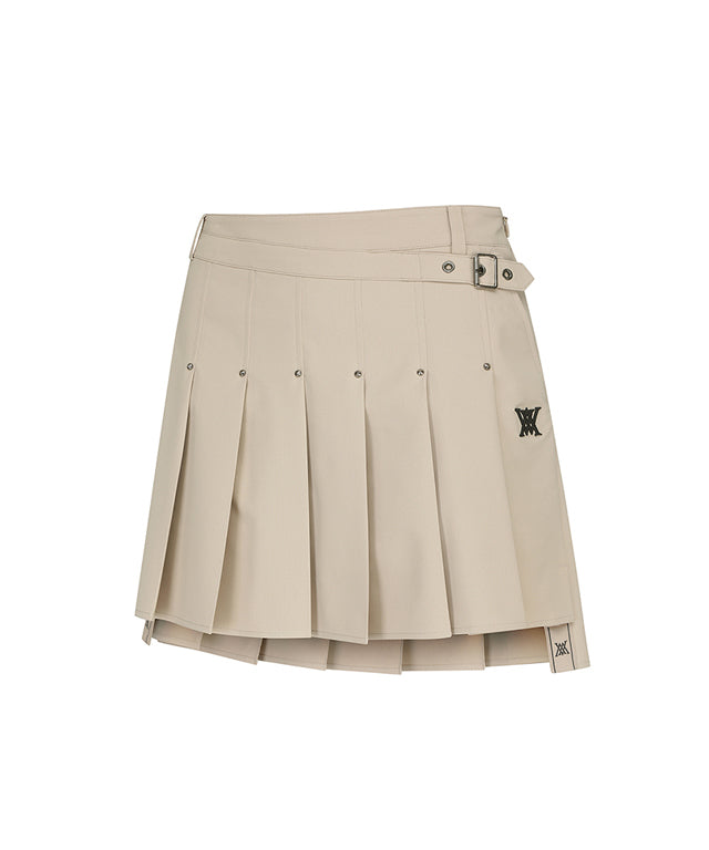 ANEW Golf Women's Buckle Decoration Pleats Skirt in Beige, showcasing pleats and buckle details.