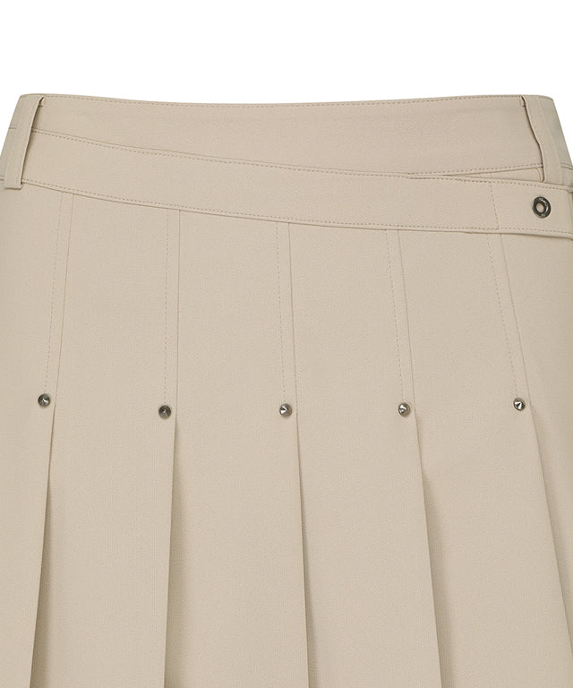 ANEW Golf Women's Buckle Decoration Pleats Skirt in Beige, showcasing pleats and buckle details.