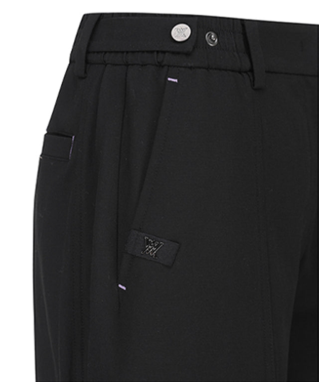 Women Incision Pocket Jogger Long Pants in black with unique incision pocket design and adjustable waistband.