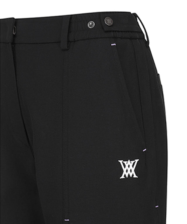 Women Incision Pocket Jogger Long Pants in black with unique incision pocket design and adjustable waistband.