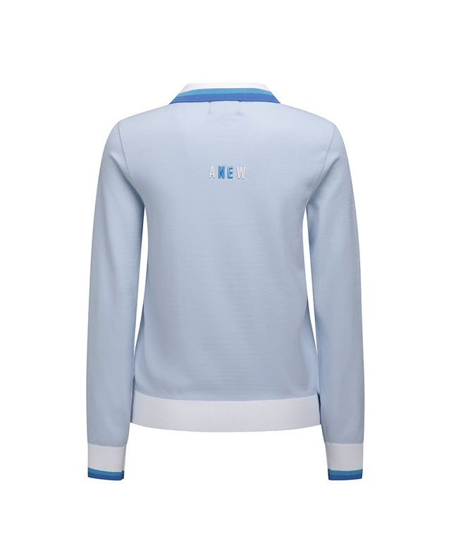 Sky blue knitted pullover sweater for women with logo and pastel color combination, featuring a round neck and button detail at the hem.