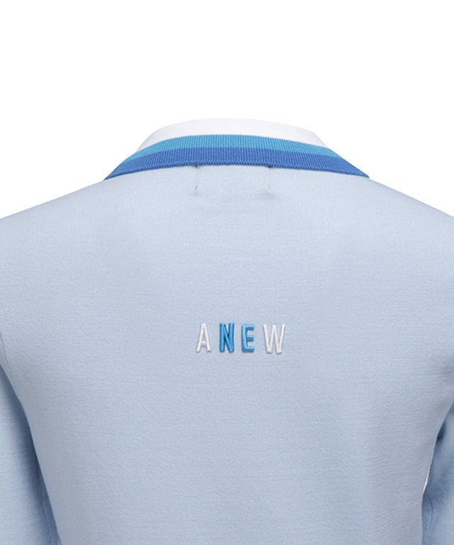 Sky blue knitted pullover sweater for women with logo and pastel color combination, featuring a round neck and button detail at the hem.