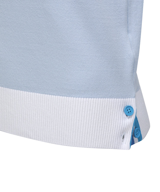 Sky blue knitted pullover sweater for women with logo and pastel color combination, featuring a round neck and button detail at the hem.