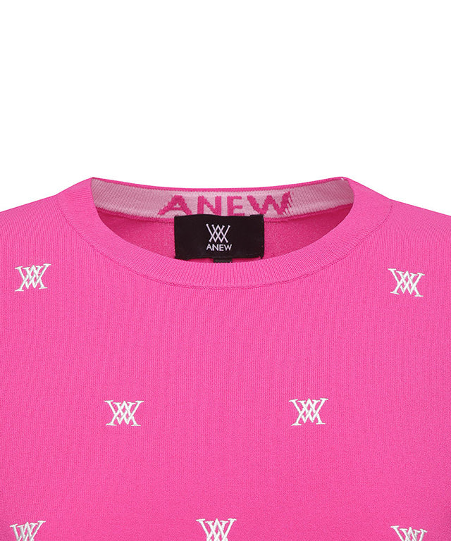 Pink pullover sweater for women featuring monogram logo and point color sleeves, perfect for golf or casual wear.