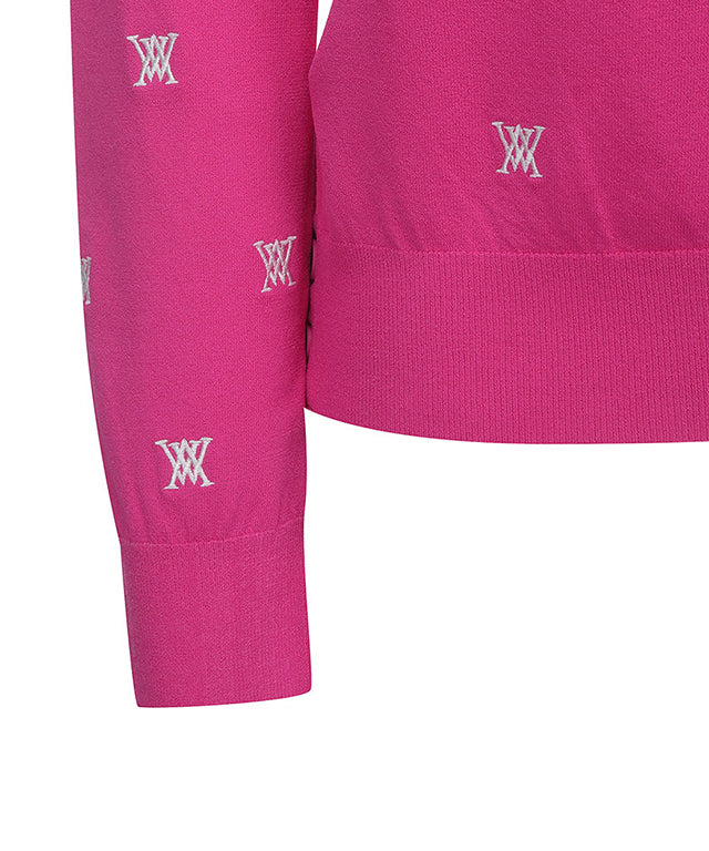 Pink pullover sweater for women featuring monogram logo and point color sleeves, perfect for golf or casual wear.