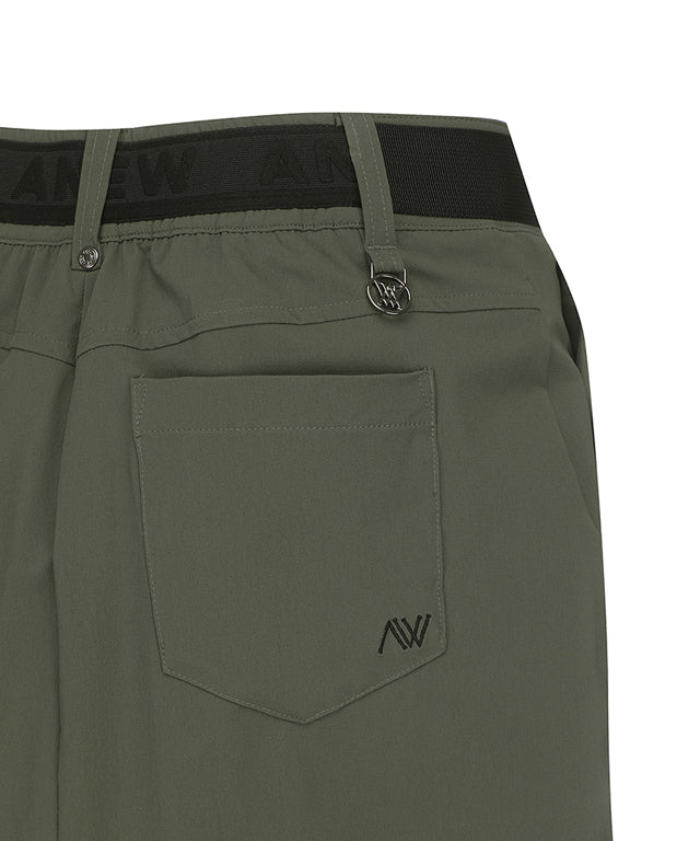 Khaki ANEW Golf Women Out Cago Pocket Skirt featuring a unique pocket design and webbing tape waist.