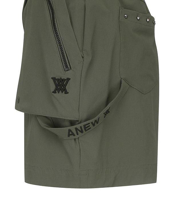 Khaki ANEW Golf Women Out Cago Pocket Skirt featuring a unique pocket design and webbing tape waist.