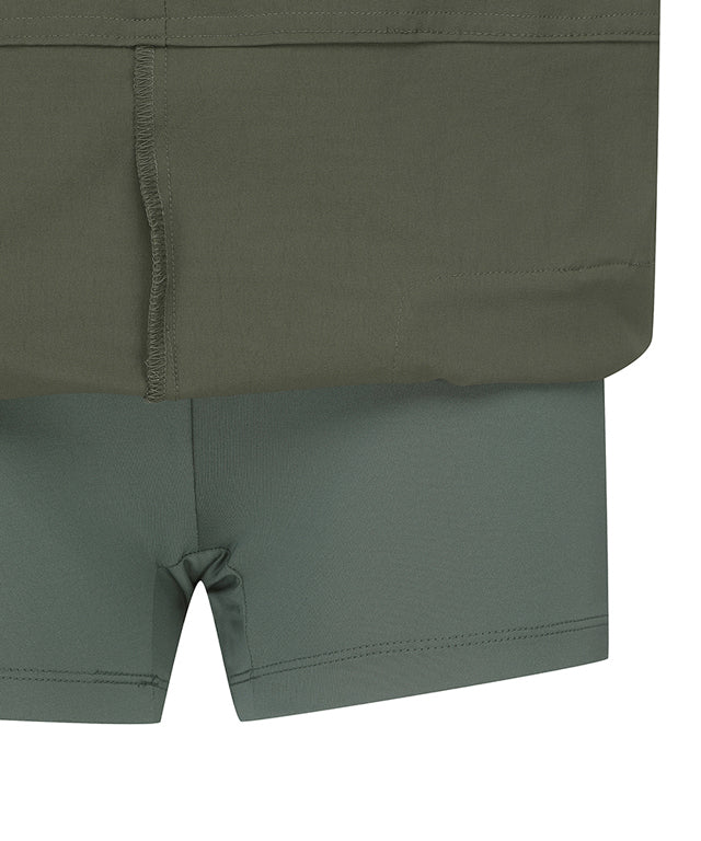 Khaki ANEW Golf Women Out Cago Pocket Skirt featuring a unique pocket design and webbing tape waist.