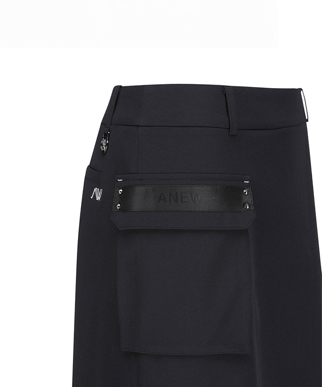 ANEW Golf Women's A-Line Skirt in black with out pocket and unique design, showcasing pleats and Anew logo.