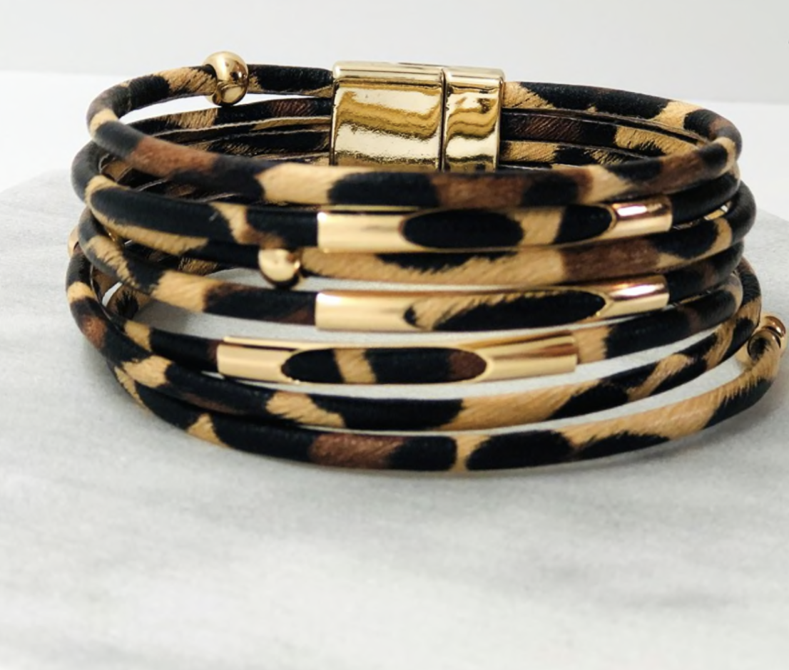 A stylish collection of animal print wrap bracelets featuring various patterns and colors, showcasing their unique design and magnetic closure.