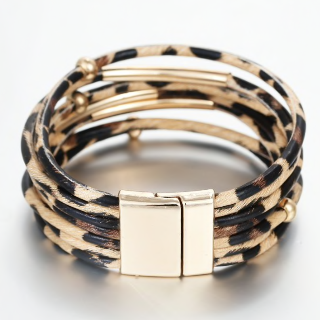 A stylish collection of animal print wrap bracelets featuring various patterns and colors, showcasing their unique design and magnetic closure.