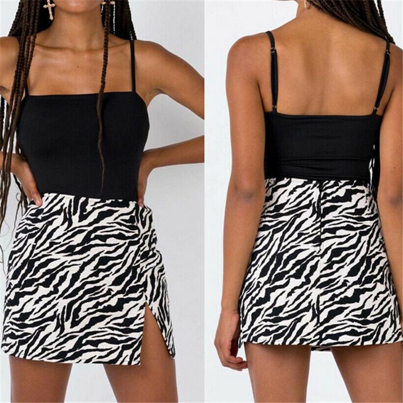 Animalia Print Mini Skirt featuring a stylish animal pattern, above knee length, and an empire waistline, perfect for clubbing and casual outings.