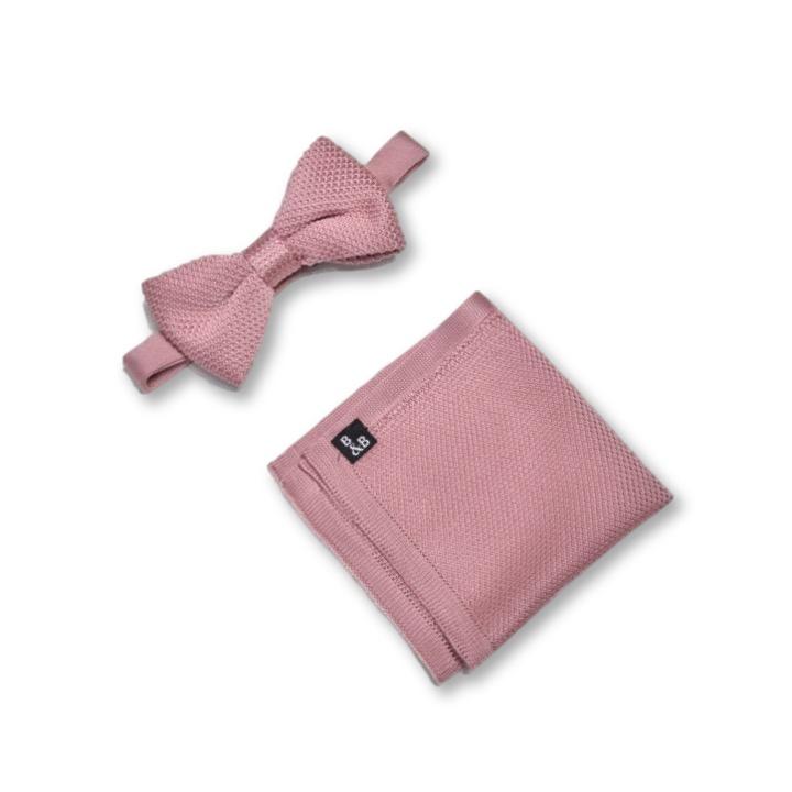 Antique rose knitted bow tie and matching pocket square set displayed elegantly, showcasing their intricate knit design and rich color.